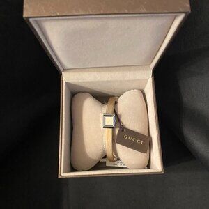 Gucci G style watch with classic taupe/brown glimmer matte sued watchband